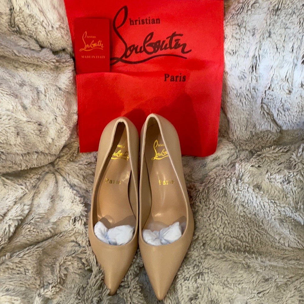 Christian Louboutin nude heels.